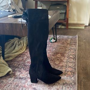 Thigh high black boots